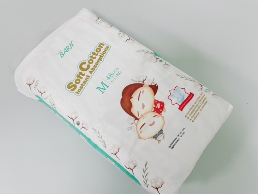 Tecido descartável do bebê da absorção macia super conservada em estoque das fraldas dos tecidos do bebê do lote